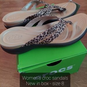 New Crocs leopard flip flops